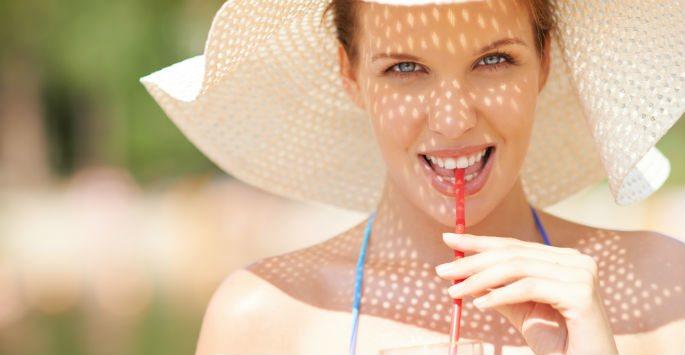 Woman in a sun hat with straw
