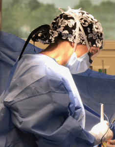 Dr. Beth Collins performing surgery